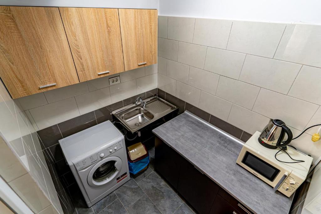 Kuchyň nebo kuchyňský kout v ubytování Casa DARYA-24h Check-in