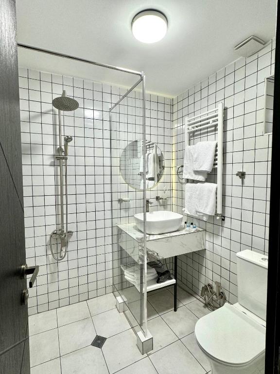 Koupelna v ubytování Garden Hotel