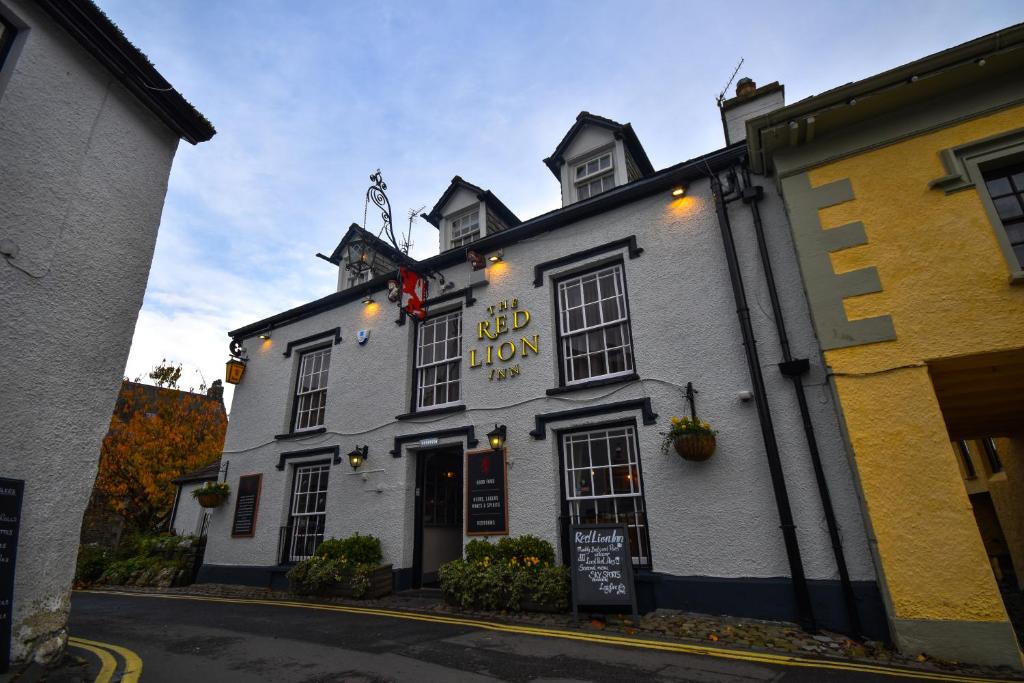 a building with a sign that reads old town pub at Red Lion Inn in Hawkshead