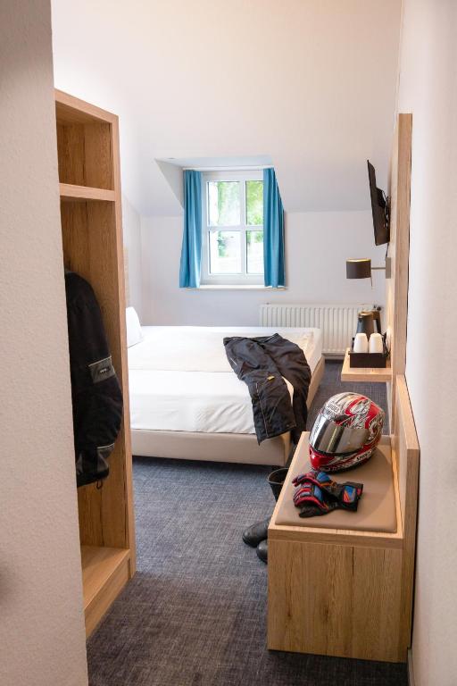 Postel nebo postele na pokoji v ubytování Hotel Haus Delecke