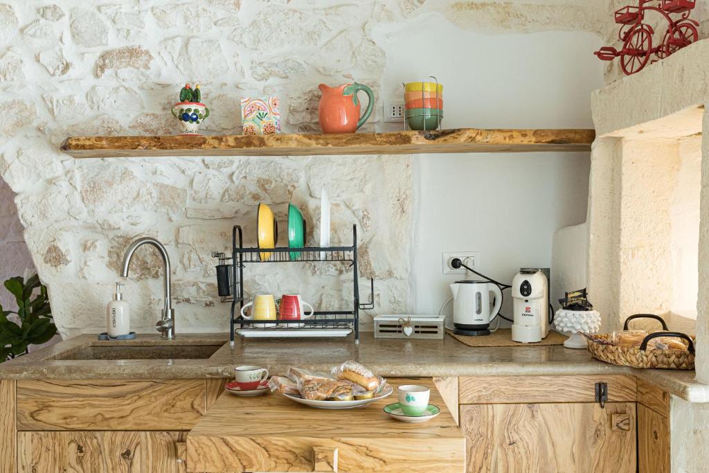 Kuchyň nebo kuchyňský kout v ubytování Luxury Suite Of Ostuni