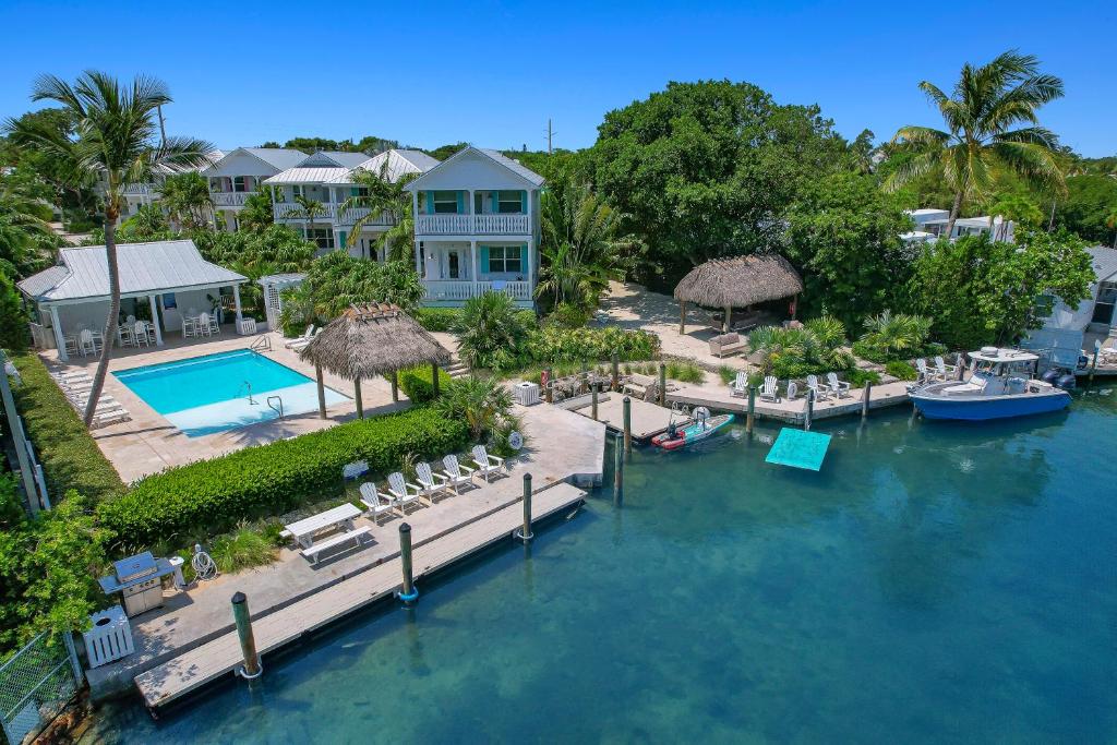 an aerial view of a resort with a pool at Isla Key Lime - Island Paradise, Waterfront Pool, Prime Location in Islamorada