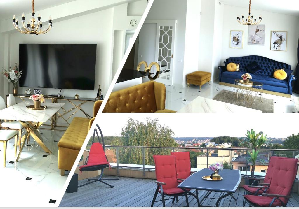 a living room with a tv and a balcony at Luxury Penthouse with Large Terrace & Panoramic Old Town View in Vilnius