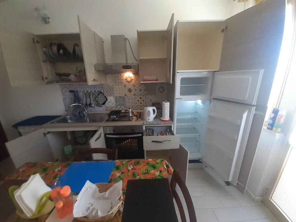 Kuchyň nebo kuchyňský kout v ubytování Mignon Locazioni brevi ad Avola - Sicilia - mare