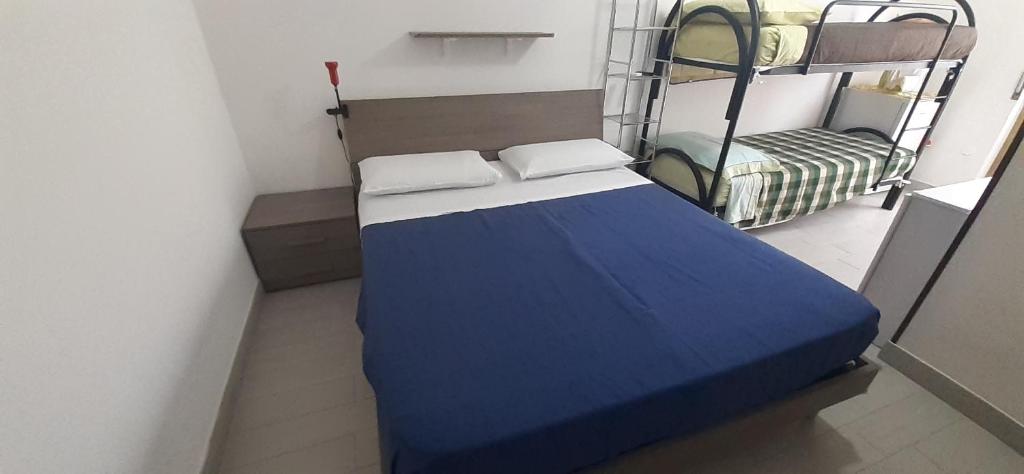 Postel nebo postele na pokoji v ubytování Mignon Locazioni brevi ad Avola - Sicilia - mare
