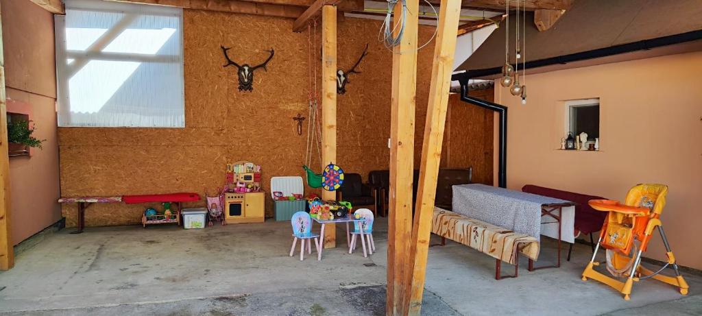 a room filled with lots of childrens furniture at U Martuly in Ružomberok