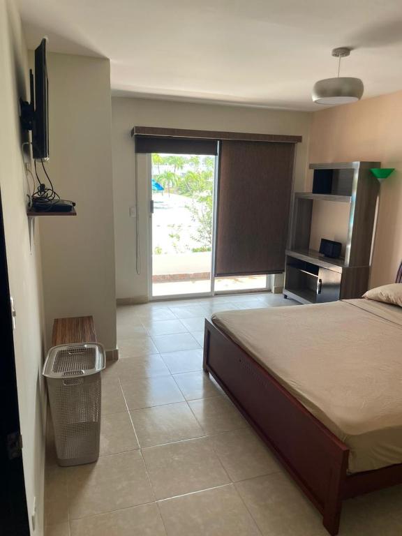 TV a/nebo společenská místnost v ubytování Ibiza beach residence Villa