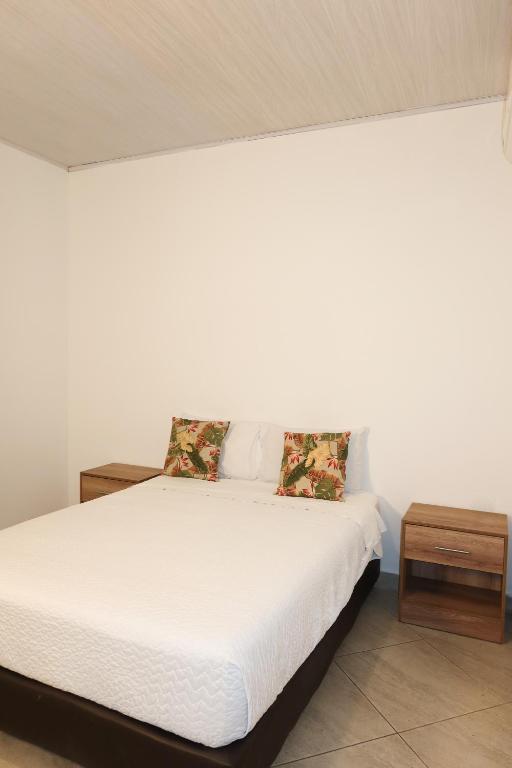 Postel nebo postele na pokoji v ubytování Hotel París