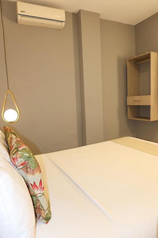 Postel nebo postele na pokoji v ubytování Hotel París