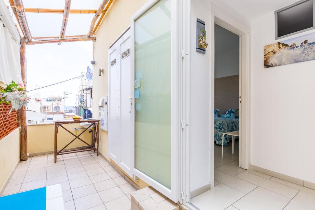 TV a/nebo společenská místnost v ubytování Fortino B&B Capri
