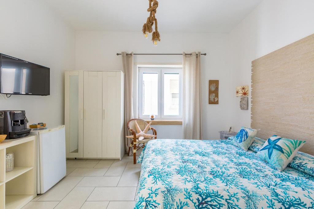 Postel nebo postele na pokoji v ubytování Fortino B&B Capri
