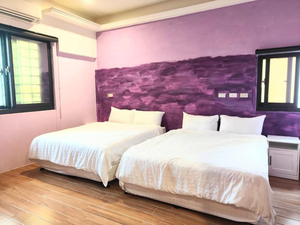 Postel nebo postele na pokoji v ubytování Xinyuanbao Shangshi Homestay