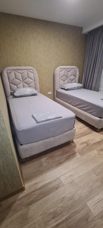 Llit o llits en una habitació de KHORGO