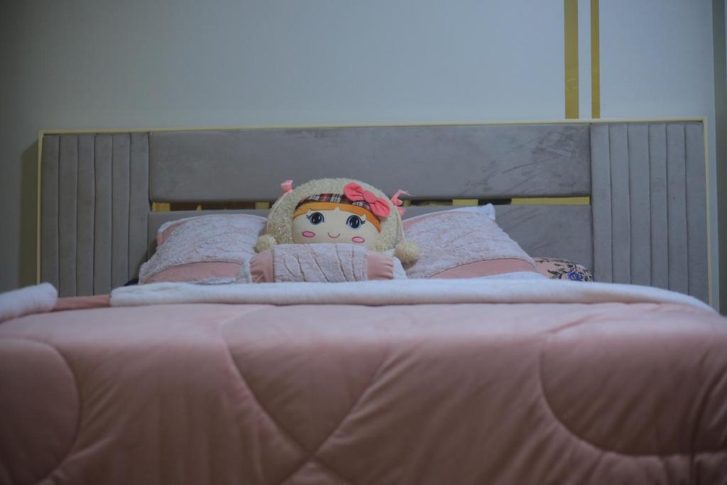 Säng eller sängar i ett rum på Erki Guest House