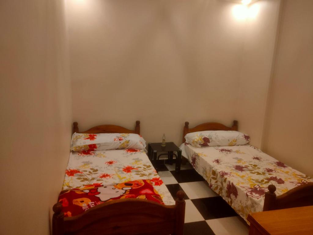 Postel nebo postele na pokoji v ubytování شقه فندقيه علي البحر Hotel apartments next to the sea