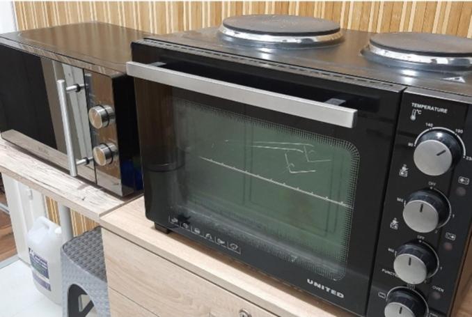 Kuchyň nebo kuchyňský kout v ubytování Dennis Apartment