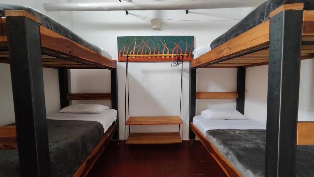 Postel nebo postele na pokoji v ubytování Popichi Hostel