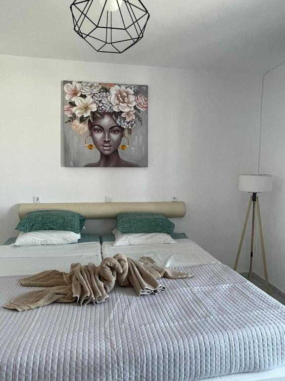 Postel nebo postele na pokoji v ubytování Lisabeth Apartments