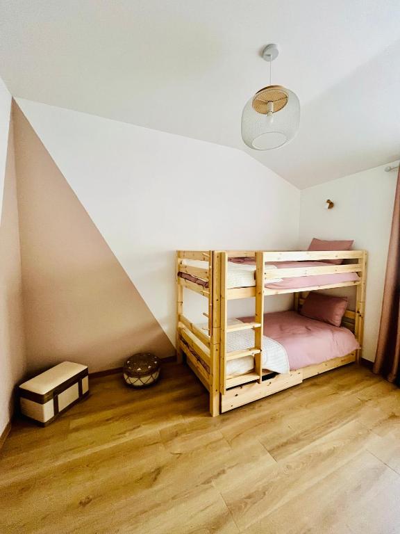 Postel nebo postele na pokoji v ubytování Les Gites d'Andréa - Chez Madame Yvon