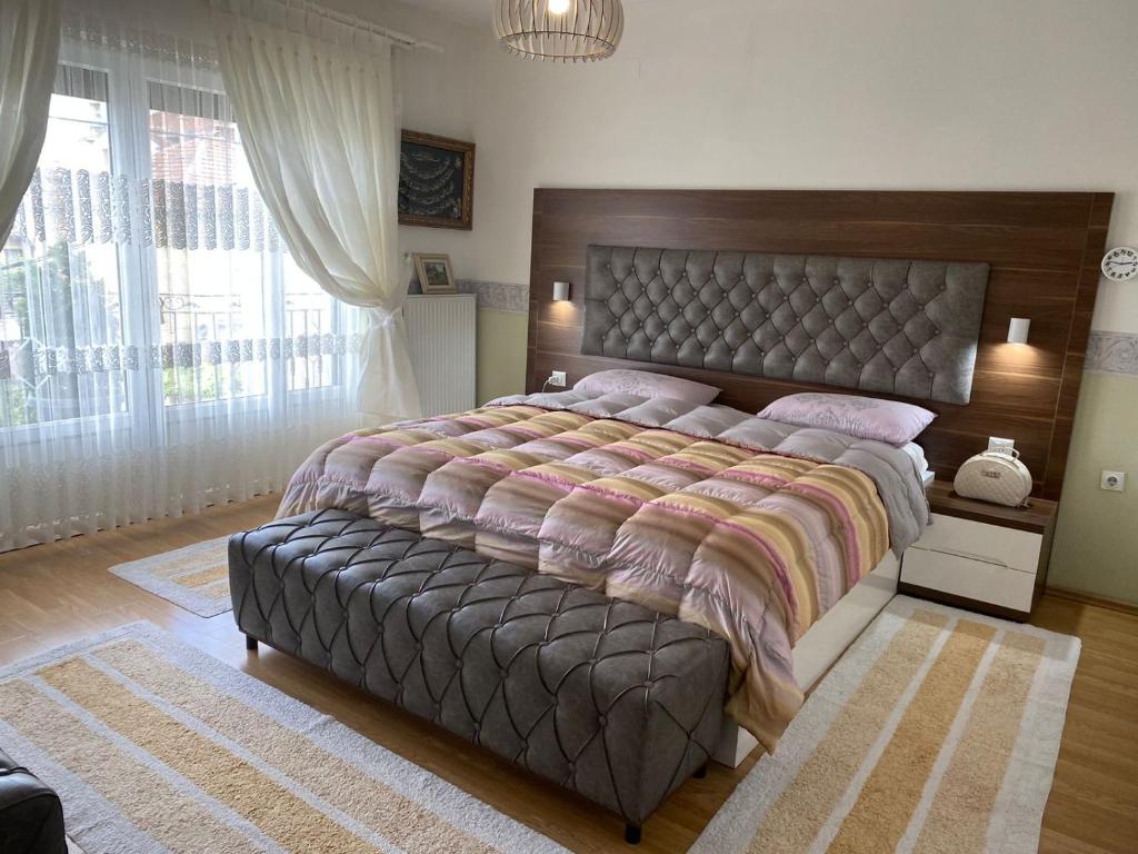 Oriental House tesisinde bir odada yatak veya yataklar