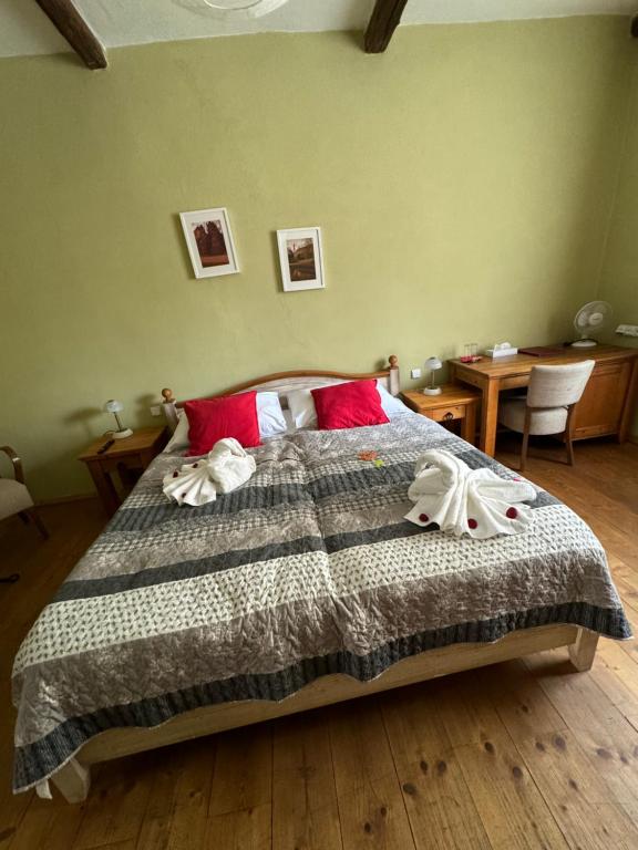 Postel nebo postele na pokoji v ubytování Hotel U Hrabenky