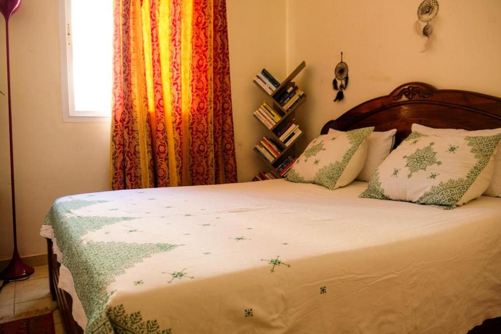 Postel nebo postele na pokoji v ubytování Room in Agadir Morocco