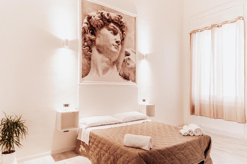 Postel nebo postele na pokoji v ubytování B&B Art
