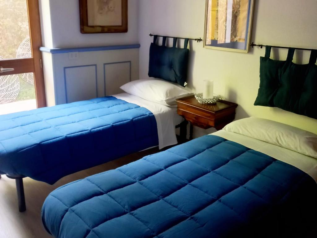 Postel nebo postele na pokoji v ubytování B&B La Risorgiva