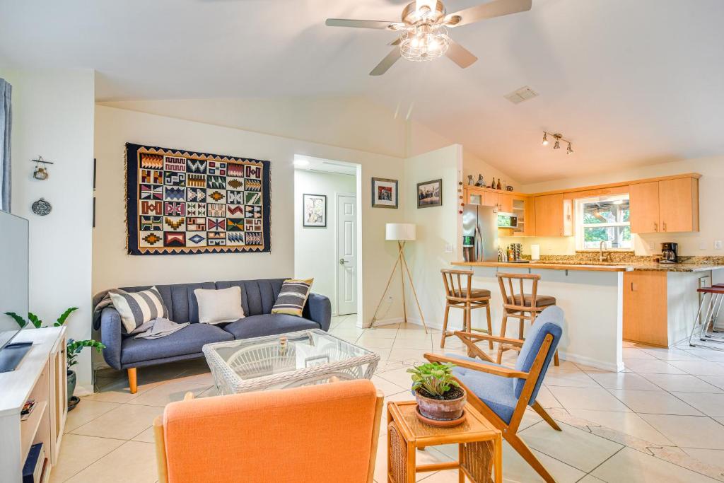 a living room with a couch and a table at Lovely St Petersburg Home with Backyard Oasis in St Petersburg