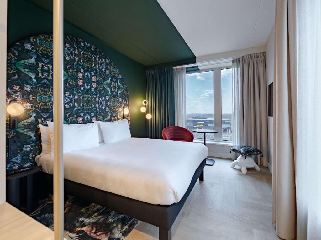 Letto o letti in una camera di ibis Styles Rotterdam Ahoy