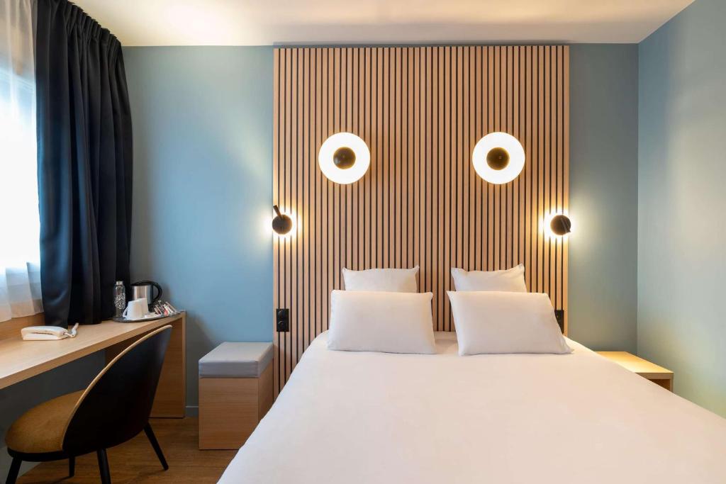 Postel nebo postele na pokoji v ubytování Best Western Bourgoin Jallieu