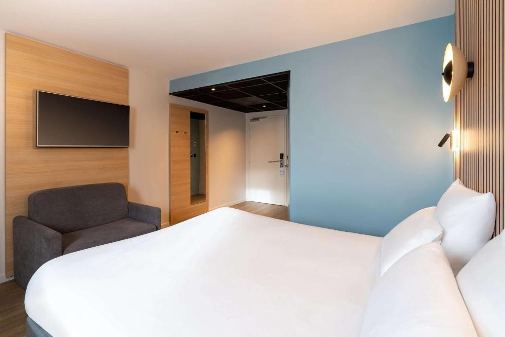 Postel nebo postele na pokoji v ubytování Best Western Bourgoin Jallieu