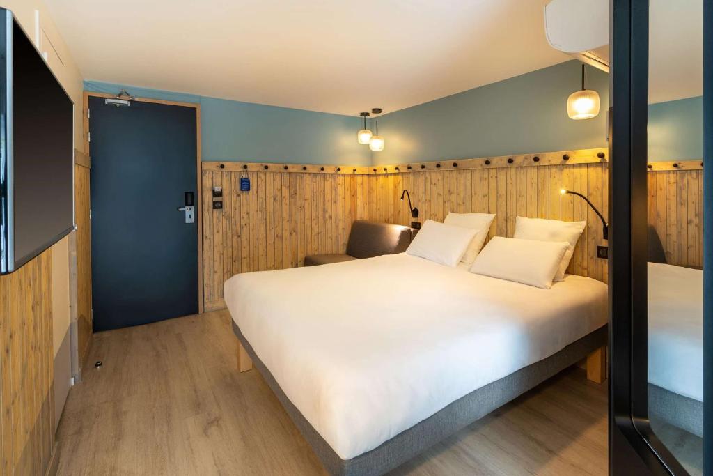 Postel nebo postele na pokoji v ubytování Best Western Bourgoin Jallieu