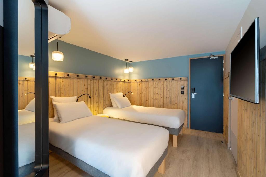 Postel nebo postele na pokoji v ubytování Best Western Bourgoin Jallieu