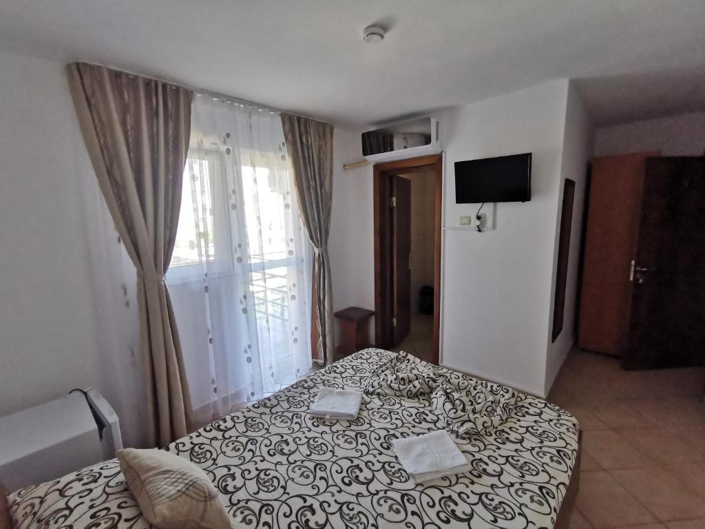 TV a/nebo společenská místnost v ubytování Vila Phoenix