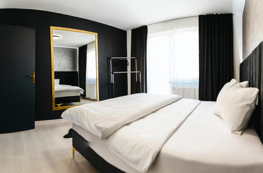 Postelja oz. postelje v sobi nastanitve Modern Lux Apartment 3