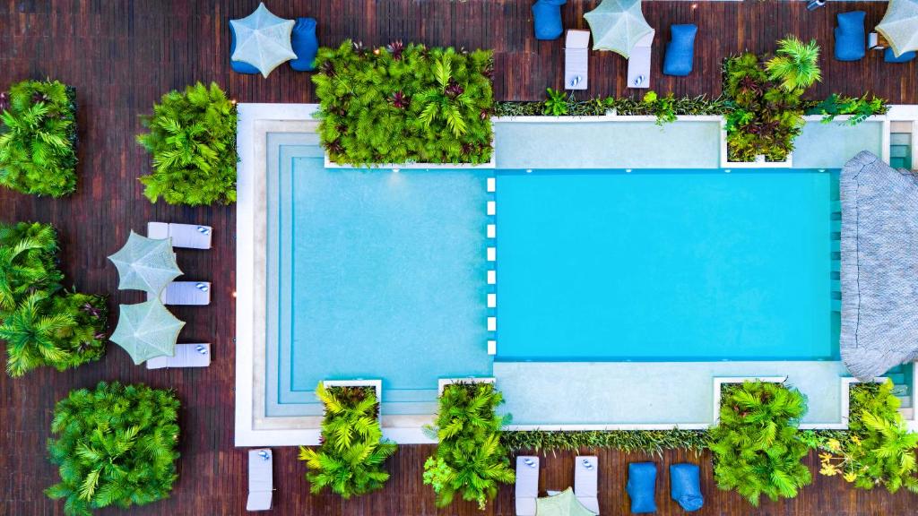 an overhead view of a swimming pool with a resort at Bakal Residence By Ruha in Tulum