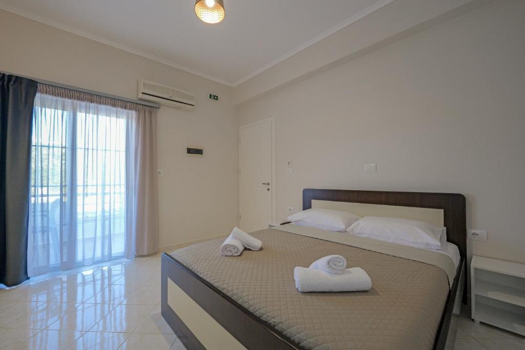 Postel nebo postele na pokoji v ubytování Hotel Deja Vu