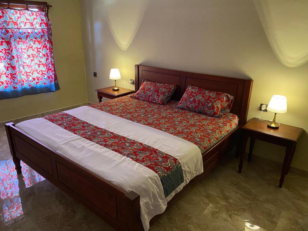 Letto o letti in una camera di Mango Guesthouse