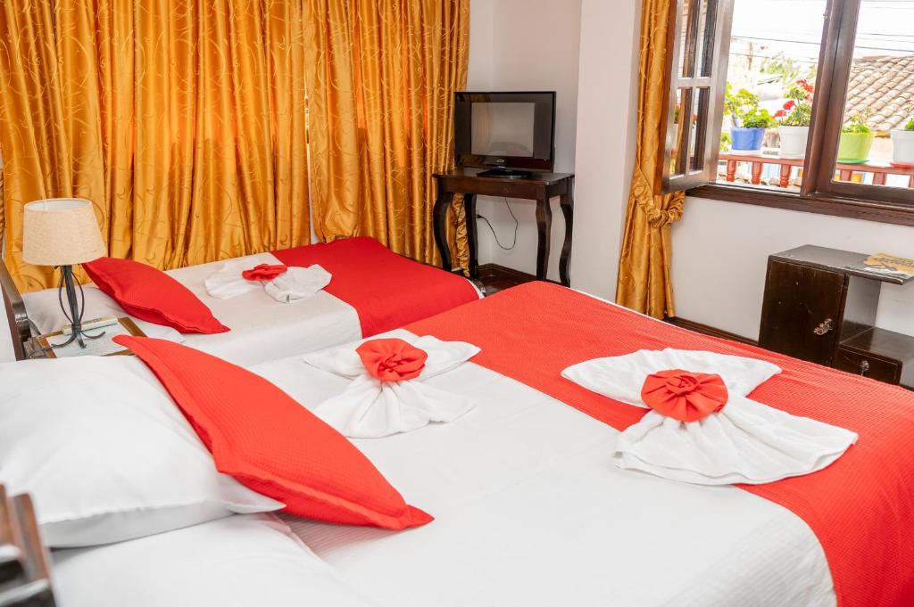 Postel nebo postele na pokoji v ubytování HOTEL LA CASONA SAN AGUSTIn