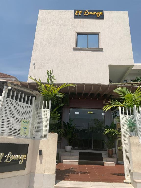 a building with a sign that reads fence at EL Apartment in East Legon