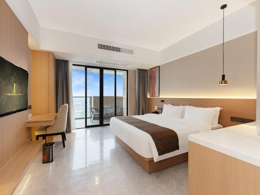 Postel nebo postele na pokoji v ubytování JD POLMAN Hotel