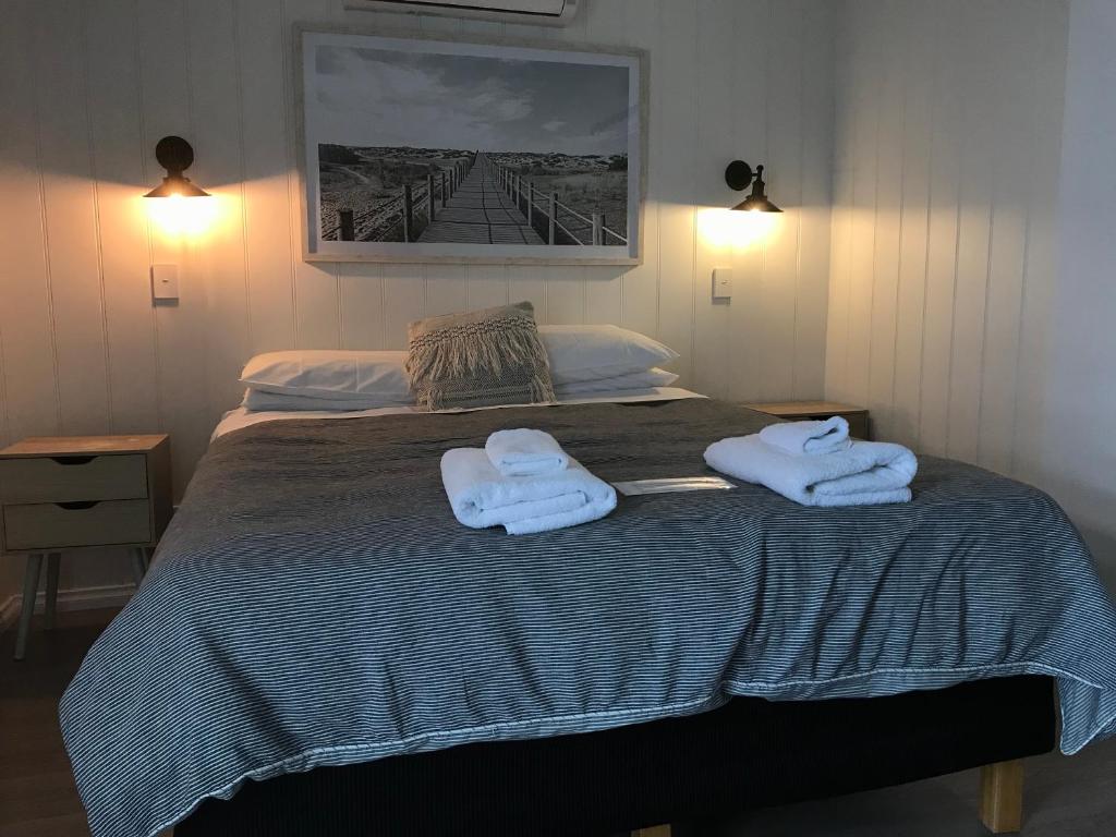 Postel nebo postele na pokoji v ubytování Beachend Bicheno