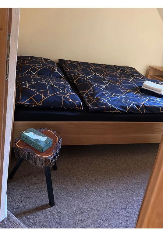 Postel nebo postele na pokoji v ubytování Sklep u Dušana