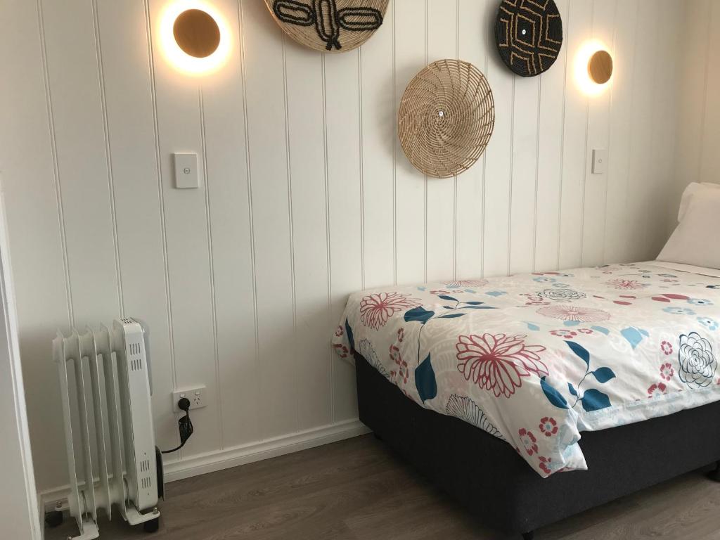 Postel nebo postele na pokoji v ubytování Beachend Bicheno