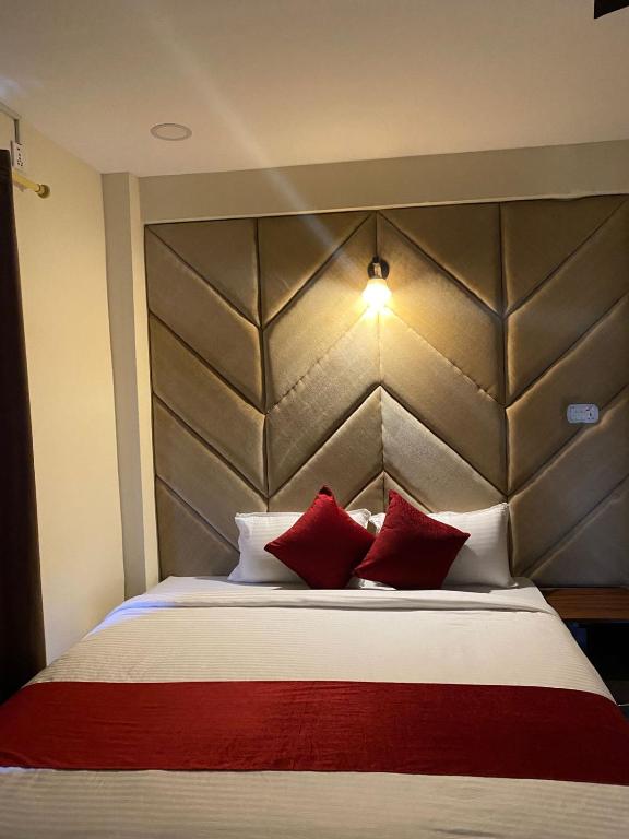 Кровать или кровати в номере Hotel Safari Suite