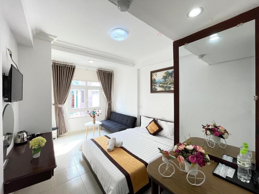 TV a/nebo společenská místnost v ubytování Hotel Đông Nhi
