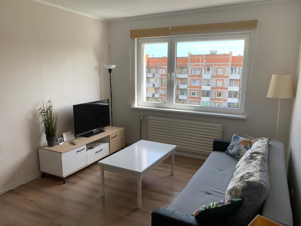 Televizorius ir (arba) pramogų centras apgyvendinimo įstaigoje Tise Apartment