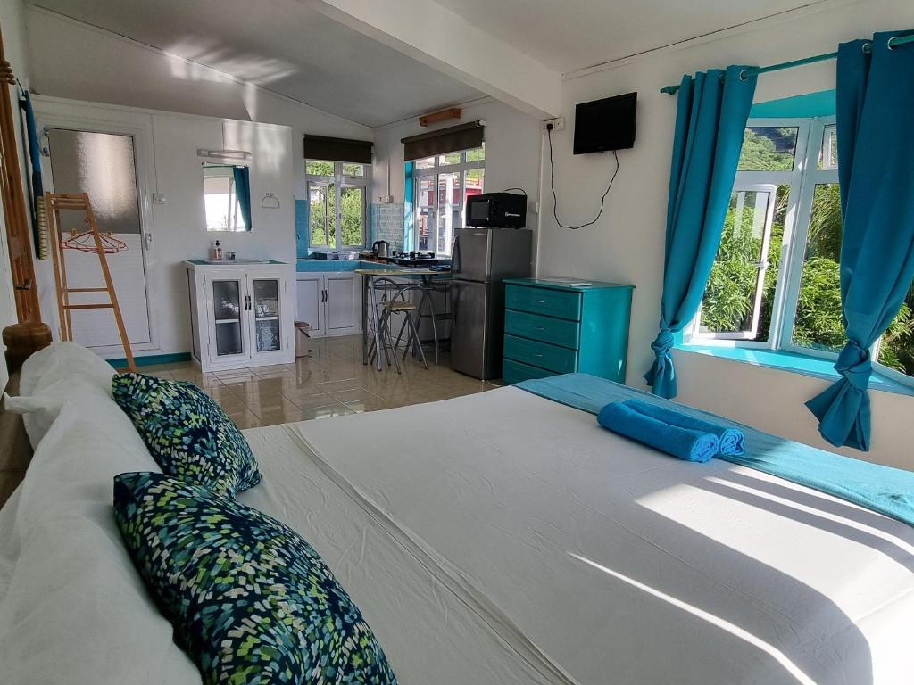 Postel nebo postele na pokoji v ubytování Surf House
