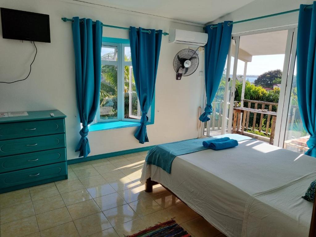 Postel nebo postele na pokoji v ubytování Surf House